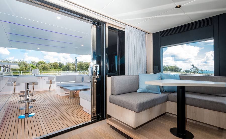 Super Yacht Charters on Aura Semi-open Sky-lounge with a bar