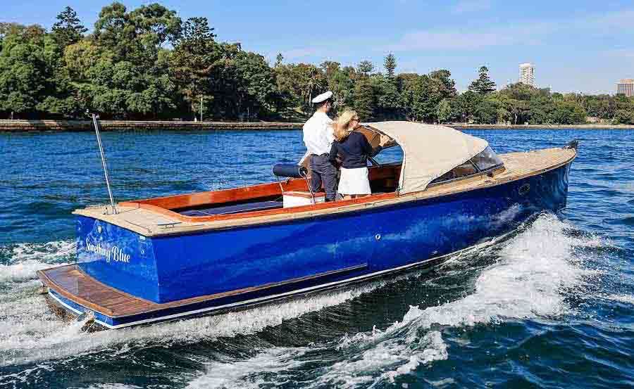Boat Hire on Something Blue stern view in Fame Cove