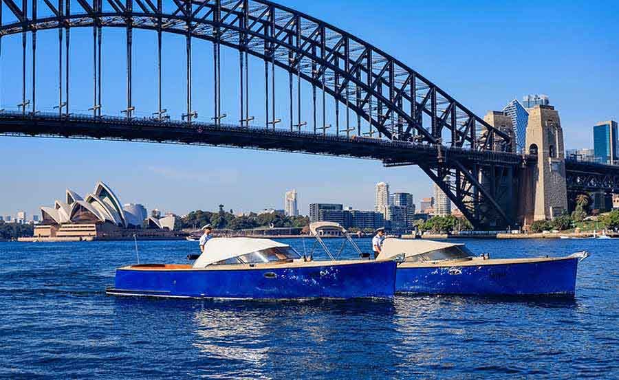 Boat Tour of Sydney Harbour and It's Secret Islands in front of Sydney harbour bridge