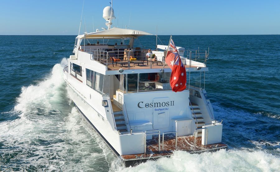 New Years Eve Cruises on Cosmos II stern view while under way