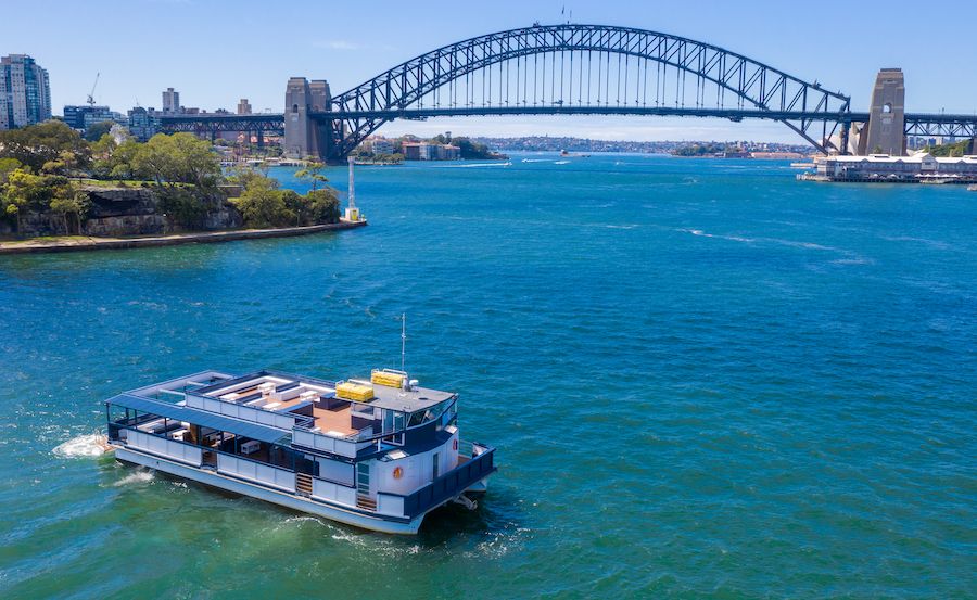 Boat Hire on Le Bleu Sydney with harbour backdrop Boat Hire on Le Bleu Sydney with harbour backdrop