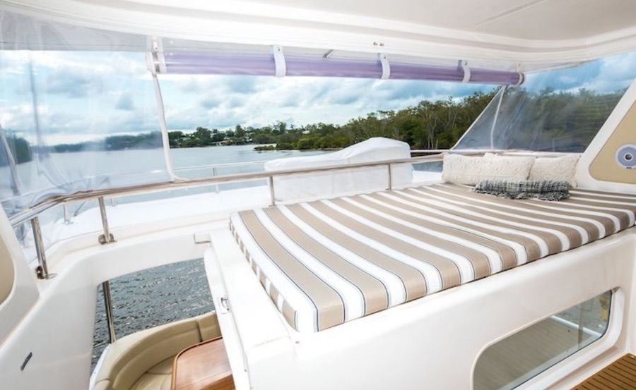 Boat Hire on Seas The Day flybridge lounge area Boat Hire on Seas The Day flybridge lounge area