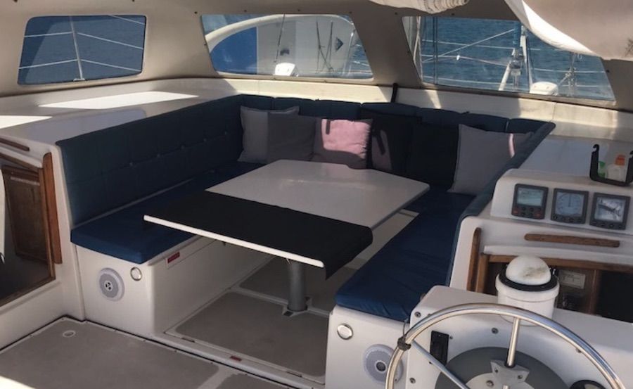 Undercover rear deck and lounge on boat hire on Seascape Undercover rear deck and lounge on boat hire on Seascape