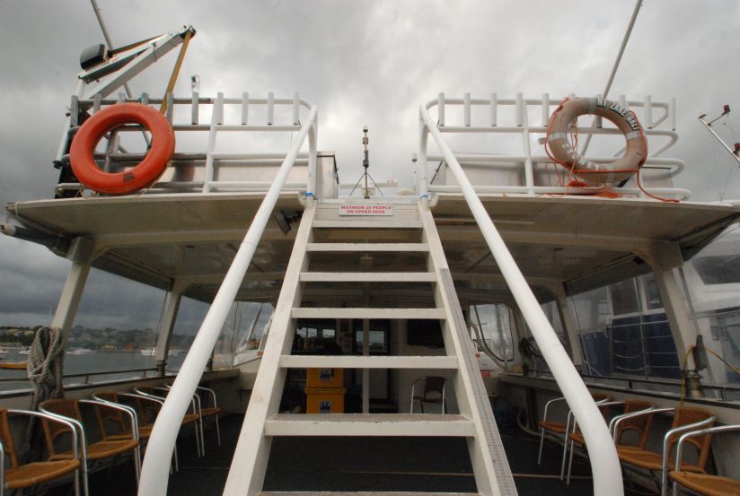 Boat hire on Zane Grey stairway to top deck Boat hire on Zane Grey stairway to top deck