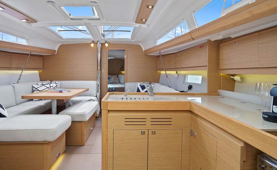 Sailing Sydney on Cavatina Galley and lounge area in main saloon