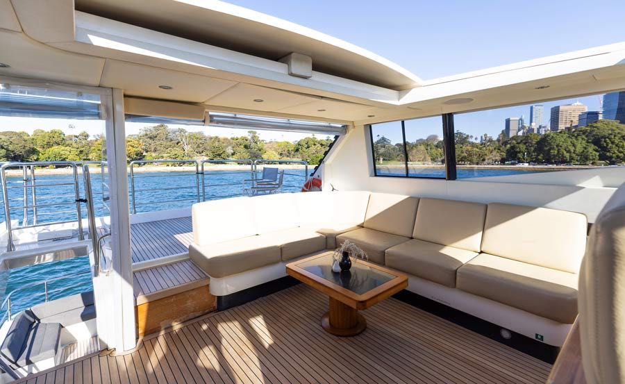 Luxury Boat Hire Sydney on Element Upper Deck and Saloon with an open sunroof 