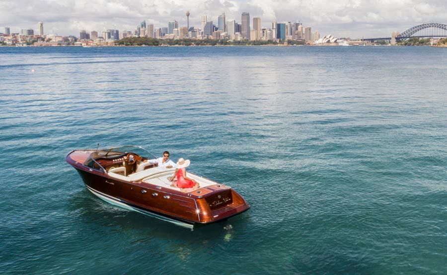 Luxury Italian Wooden Speedboat Cruises in New South Wales on Sydney Harbour overlooking the Sydney Opera House and Sydney Harbour Bridge Luxury Italian Wooden Speedboat Cruises in New South Wales on Sydney Harbour overlooking the Sydney Opera House and Sydney Harbour Bridge
