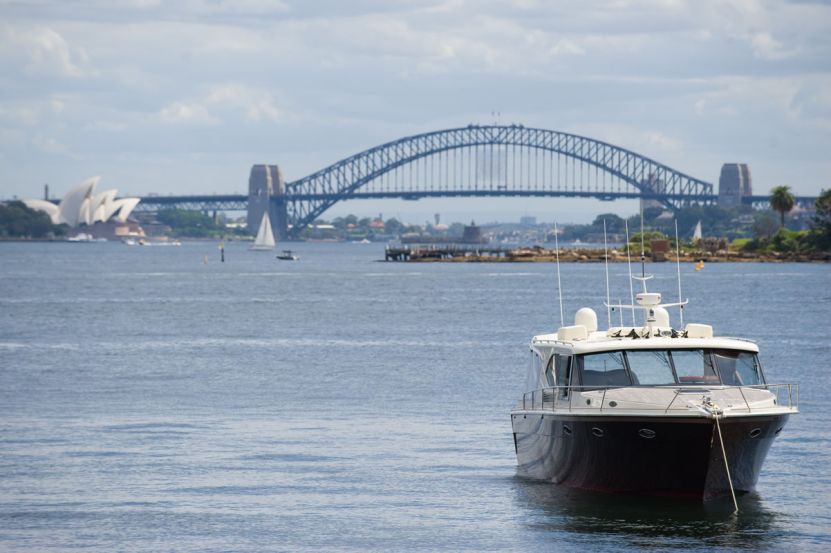 Luxury boat hire on Dreamtime Harbour Bridge background Luxury boat hire on Dreamtime Harbour Bridge background