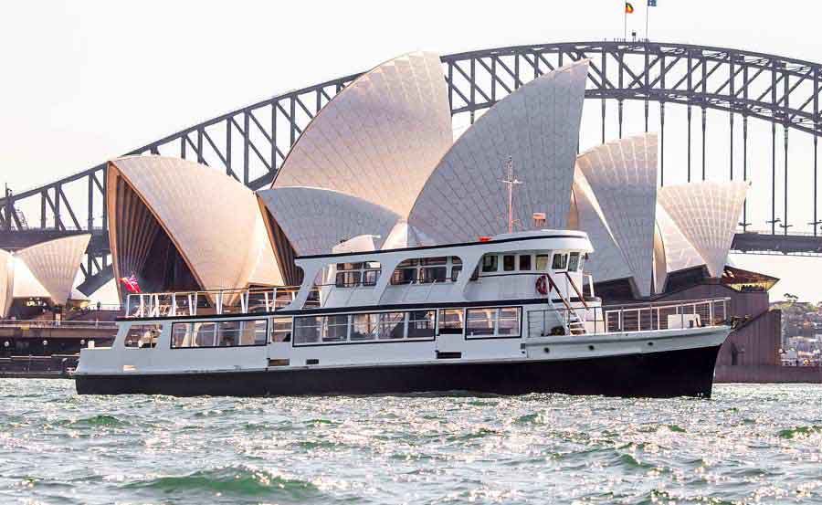 Boat Hire on Mandalay in front of the Sydney Harbour Bridge