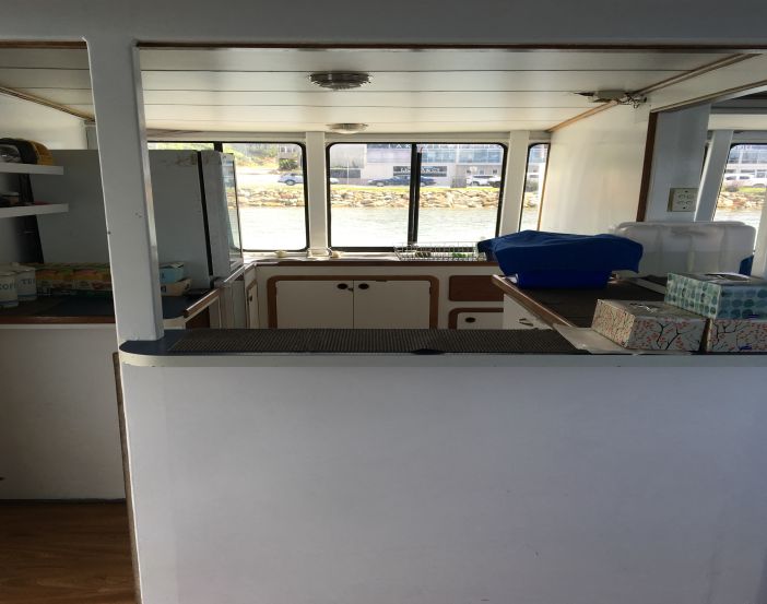 https://www.anyboat.com.au/media/catalog/product/cache/3d98a21d93a47449f8fd839055ce5f12/n/e/new-years-cruise-on-mv-explorer-bar-area.jpg