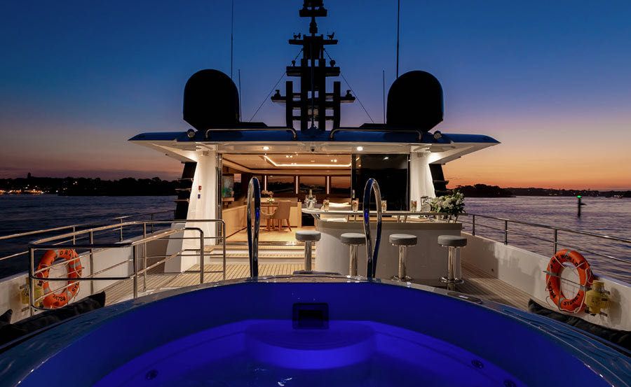 Whitsundays Super Yacht Hire on ONEWORLD Upper deck with Jacuzzi and Bar Whitsundays Super Yacht Hire on ONEWORLD Upper deck with Jacuzzi and Bar