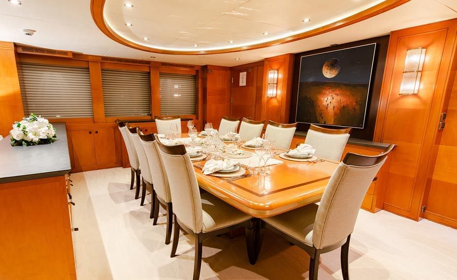 Whitsundays Super Yacht Hire on Pleiades II Main Saloon Dining Area 