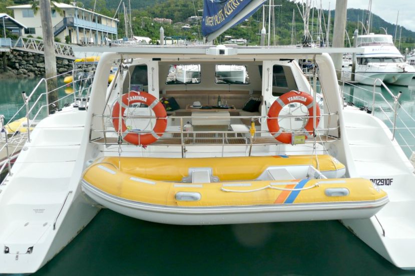 Rear view of Whitsundays Sailing on Yaminda with tender