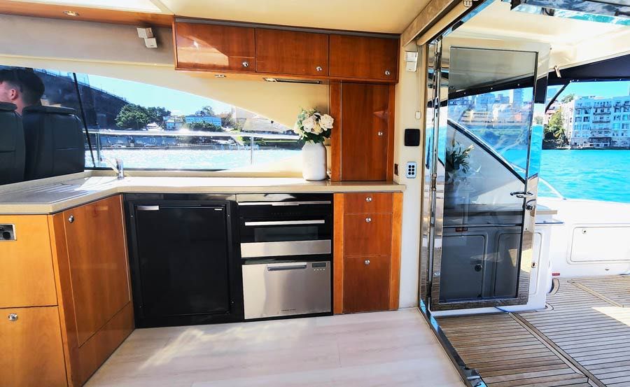Vivid Cruises on Seaduction Main Saloon Kitchen from port side