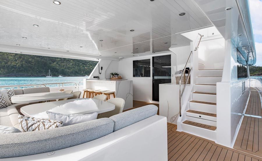 Whitsunday super yacht hire on Segara lower deck outdoor Dining area Whitsunday super yacht hire on Segara lower deck outdoor Dining area
