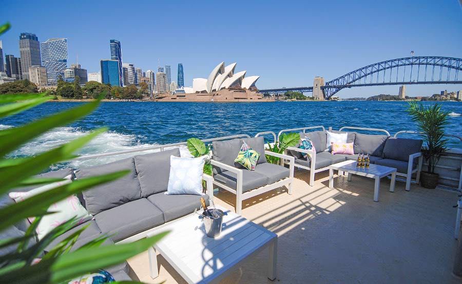 Boat Hire on Whitehaven Lower Deck Sydney Harbour Bridge and Opera House in background Boat Hire on Whitehaven Lower Deck Sydney Harbour Bridge and Opera House in background