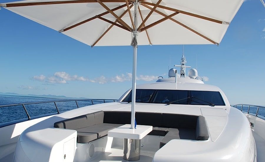 Whitsunday super yacht hire on Quantum umbrella on deck Whitsunday super yacht hire on Quantum umbrella on deck